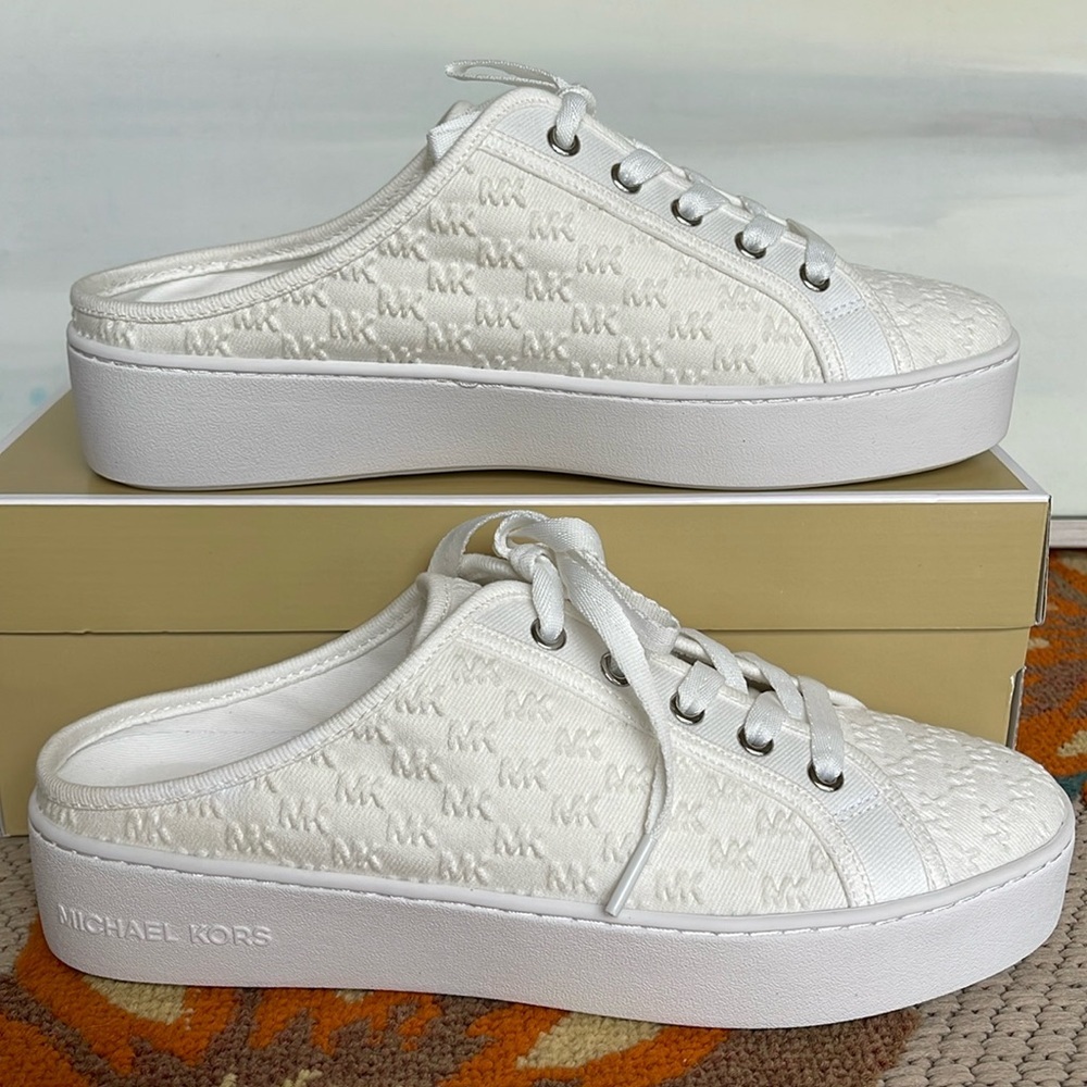 Michael Kors POPPY SLIDE SNEAKERS MK DEBOSSED WASHED DENIM
49T4POFP2D Platforms - Picture 1 of 16